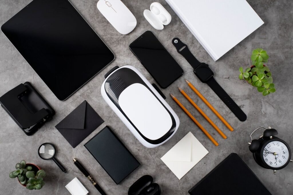 An organized display of modern stationery items, including notepads, pens, and letterheads, arranged aesthetically for a contemporary workspace.